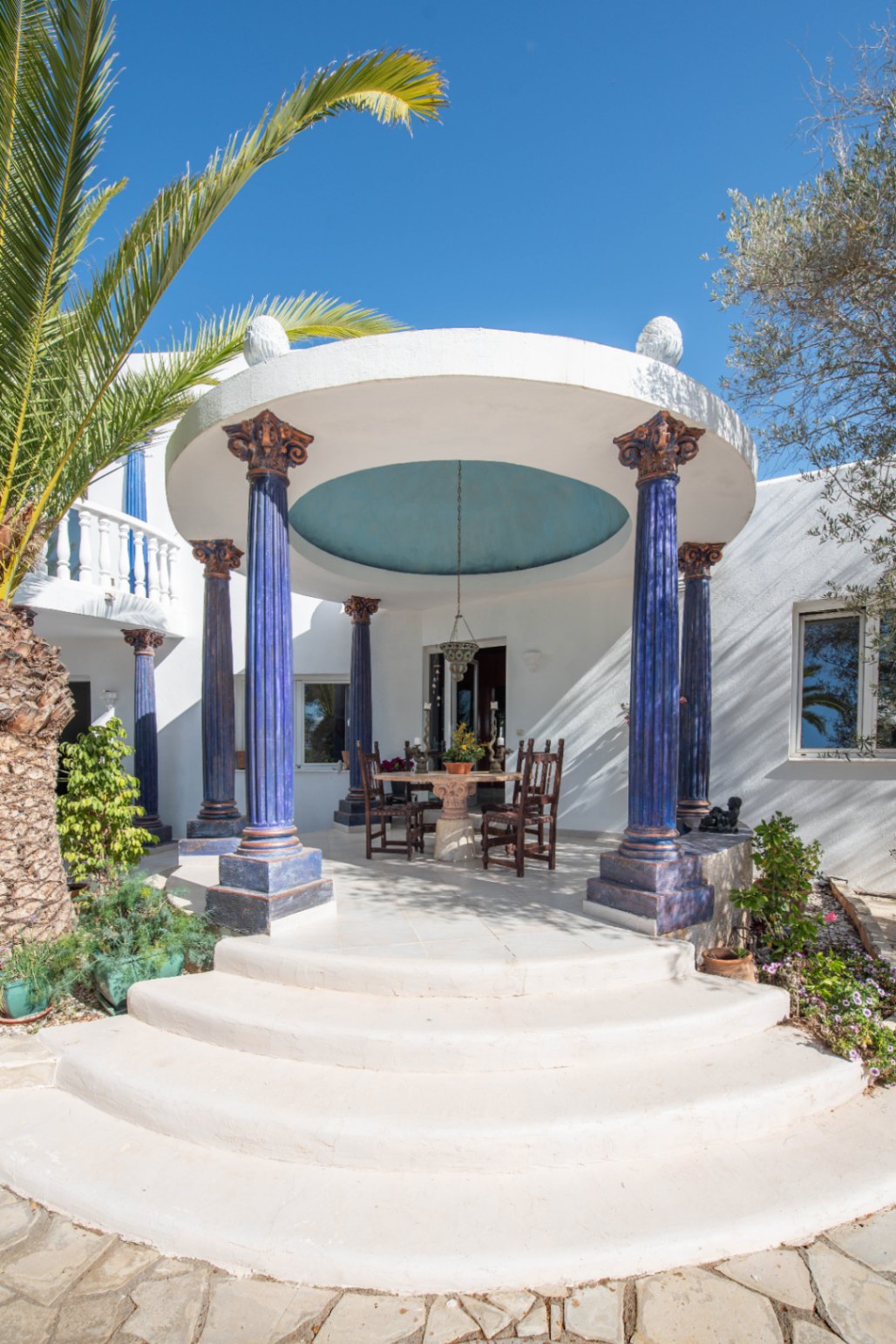 Luxury villa in Ibiza with 6 bedrooms and a modern pool.
