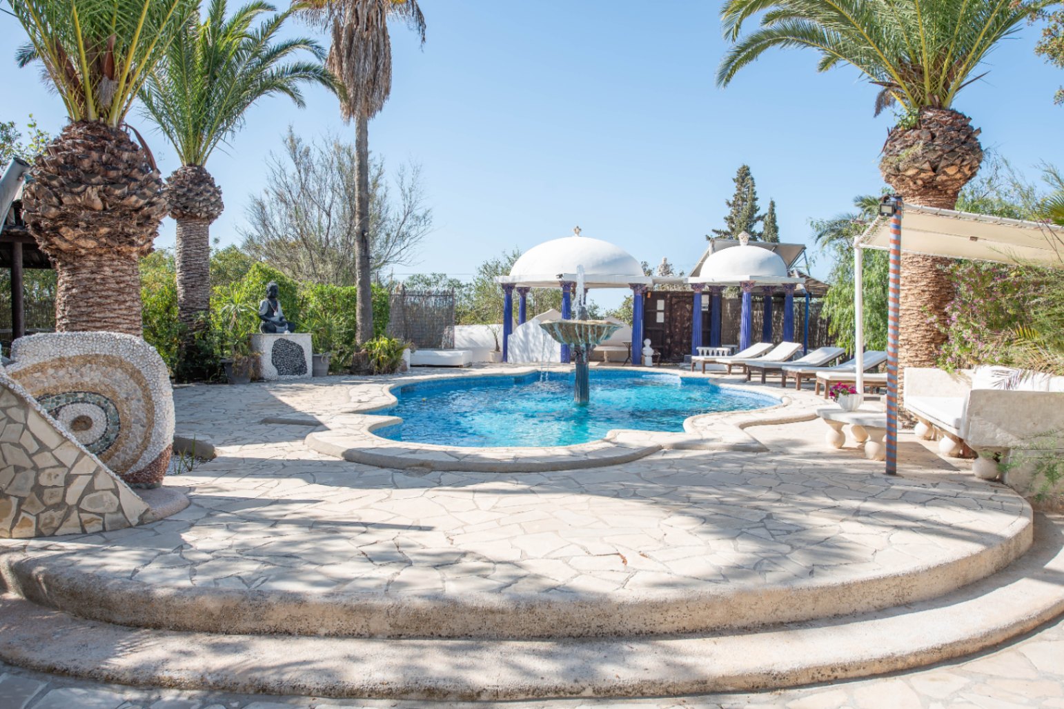 Luxury villa in Ibiza with 6 bedrooms and a modern pool.