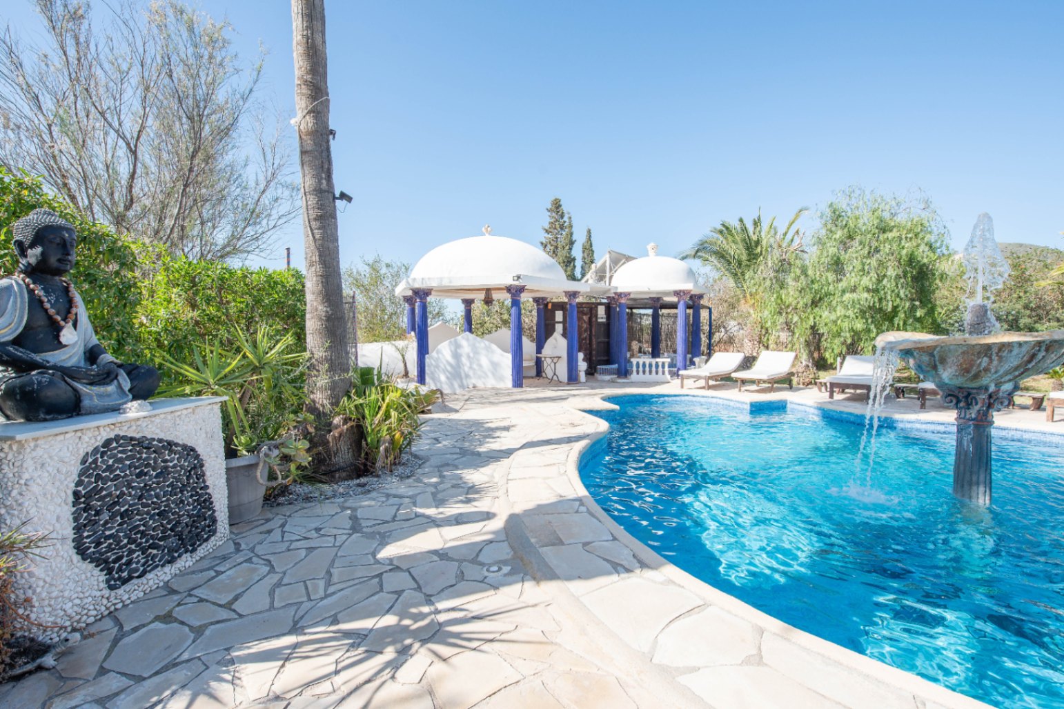 Luxury villa in Ibiza with 6 bedrooms and a modern pool.