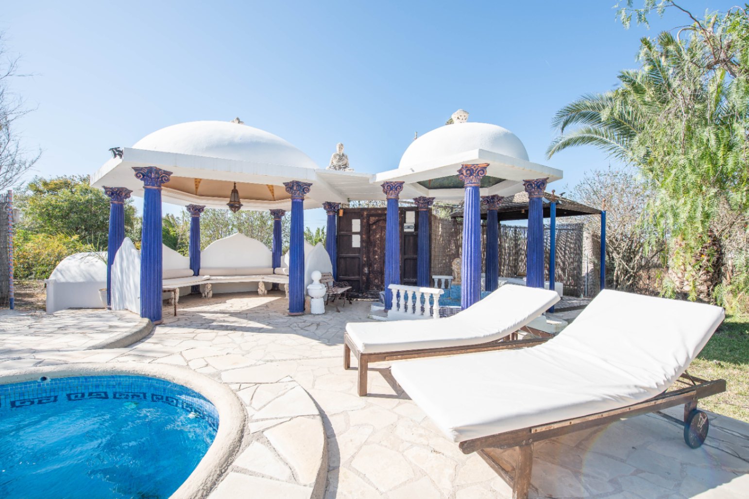 Luxury villa in Ibiza with 6 bedrooms and a modern pool.