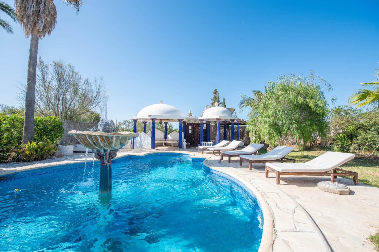Luxury villa in Ibiza with 6 bedrooms and a modern pool.