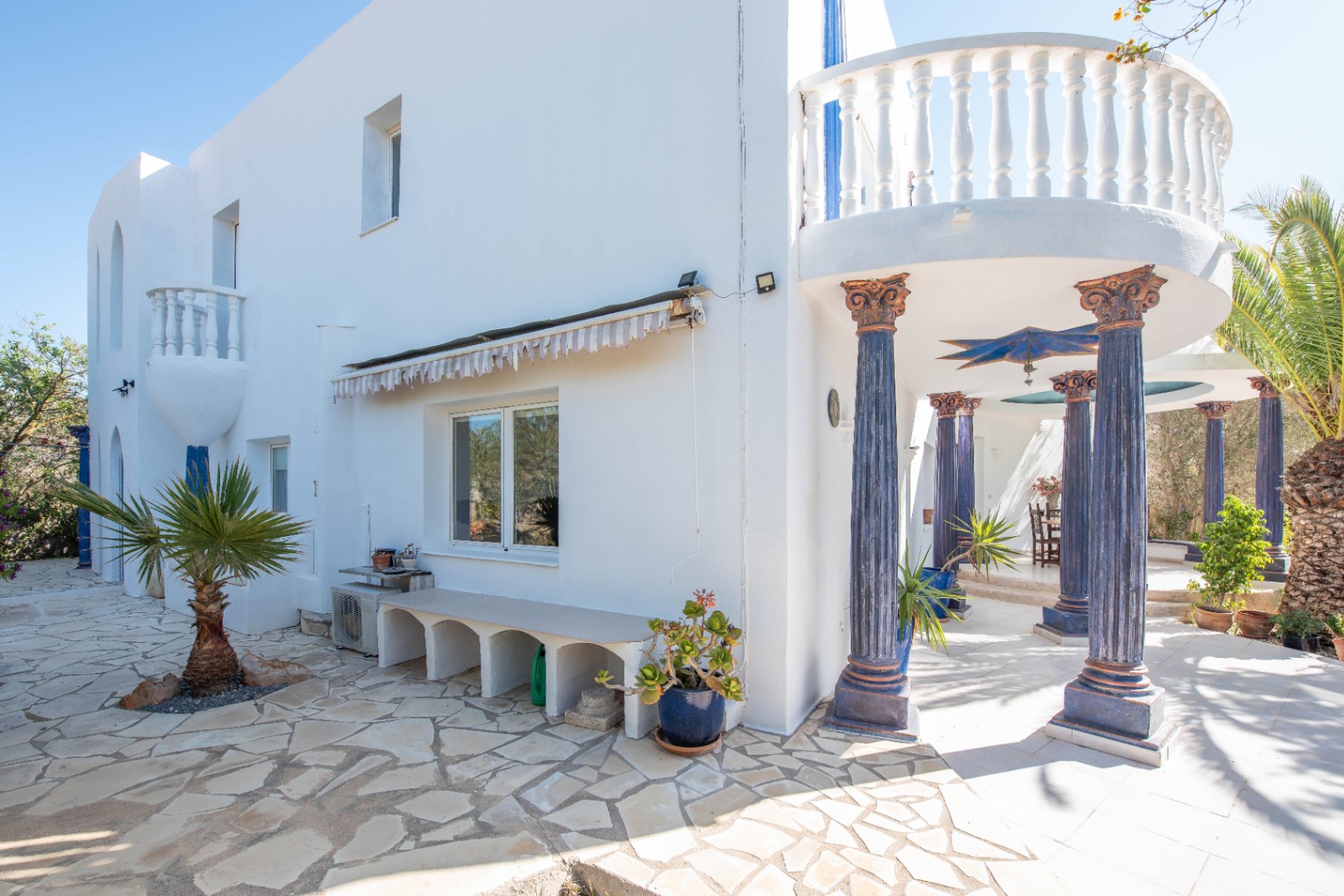 Luxury villa in Ibiza with 6 bedrooms and a modern pool.