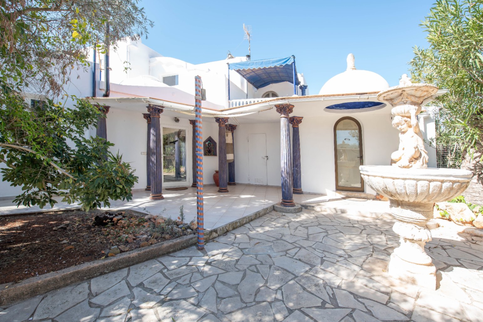 Luxury villa in Ibiza with 6 bedrooms and a modern pool.