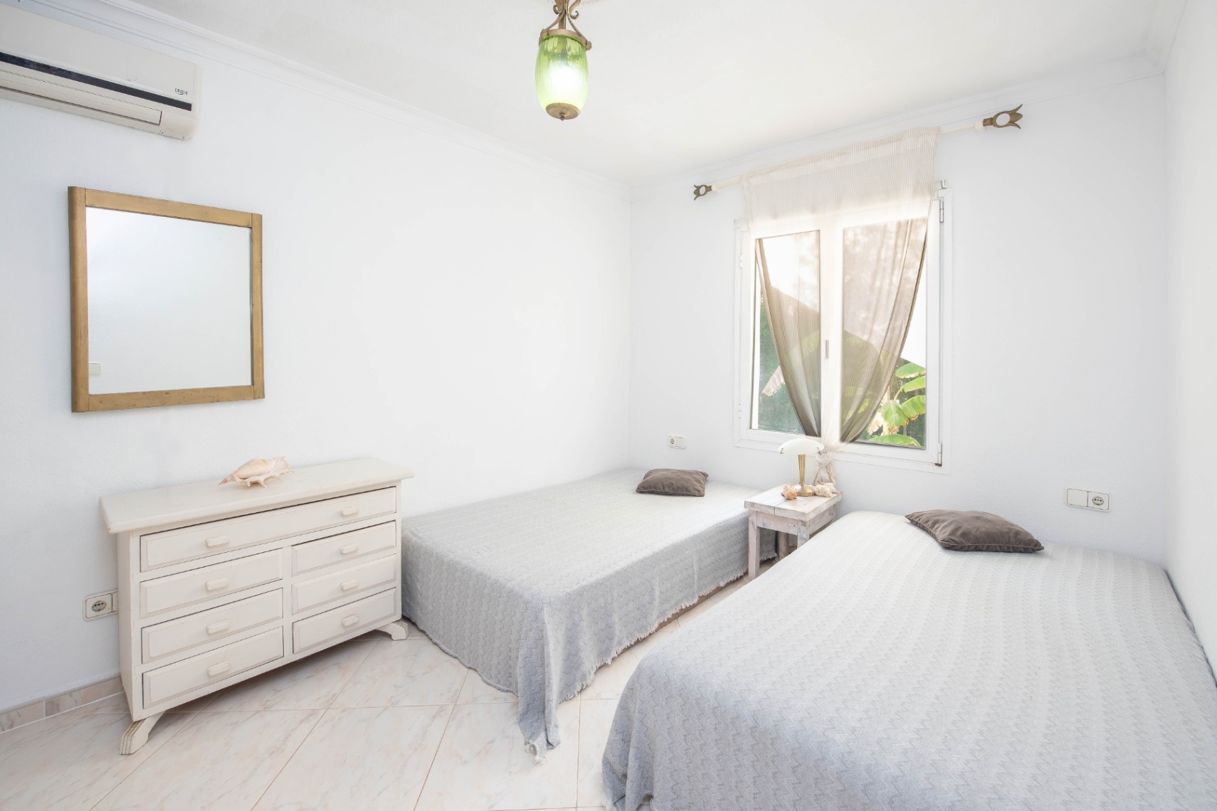 Luxury villa in Ibiza with 6 bedrooms and a modern pool.