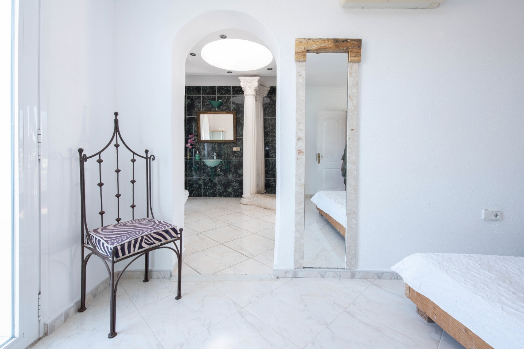 Luxury villa in Ibiza with 6 bedrooms and a modern pool.